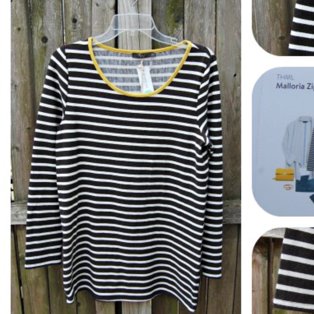 A striped black and white THML sweater.